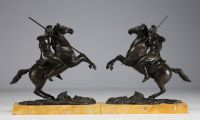 Pair of equestrian sculptures in bronze, figures in the antique style, on a marble base, Charles X period