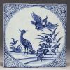 China - A blue-white porcelain floor tile decorated with birds from the 18th century.