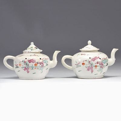 (2) Famille Rose porcelain teapots decorated with figures