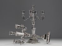 Pair of solid silver candlesticks, five points of light, hallmarks (three diamonds) on the base.