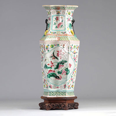 Porcelain vase of the pink family decorated with 19th century peacocks