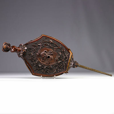 Carved wooden bellows from the 19th century.