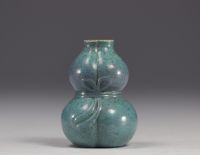 China - double gourd vase in partridge egg color.