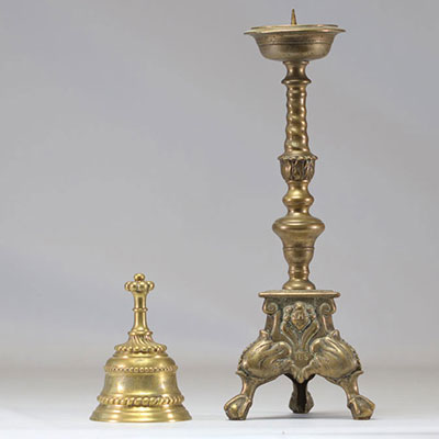 Bronze candlestick and bell dated 1699