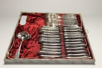 112-piece silver-plated household set.