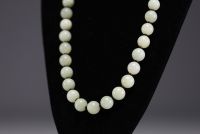 China - Jade pearl and black coral necklace, silver clasp.