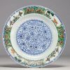 China - A green family polychrome porcelain plate with floral decoration, Qing Dynasty, Kangxi period.