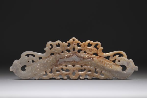 China - Pendant in gray/green jade, decorated with phoenixes and dragons.