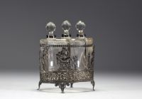 Three glass perfume bottles with silver mountings in the Empire style.