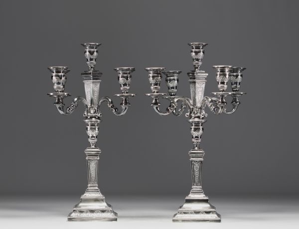 Pair of solid silver candlesticks, five points of light, hallmarks (three diamonds) on the base.