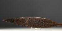 New Guinea, Sepik, Ceremonial paddle in carved wood with traces of polychromy.