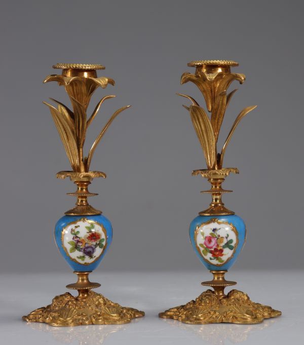 Pair of porcelain and gilt bronze candlesticks