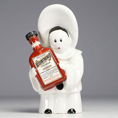 Pierrot publicitaire en porcelaine d'après Jean Adrien MERCIER pour Cointreau Liqueur à Angers.