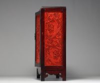 China - Hardwood cabinet inlaid with cinnabar panels, 19th century.