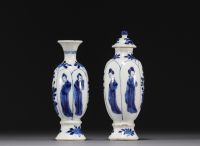 China - Pair of small vases in blue-white porcelain decorated with women, Kangxi period.