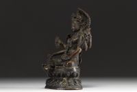 Chine - Tibet - Vasudhara, sculpture en bronze à patine foncée.