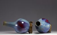 Rare pair of porcelain vases with flamed glaze mounted on bronze from 18th century