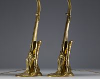 Louis MAJORELLE (1859-1926) - Rare paire de lampes de table en bronze doré en forme de nénuphar, bobèches en verre Daum Nancy rapportées.