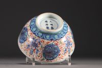 China - Large porcelain bowl decorated with lions in cartouche and flowers, Ming mark.