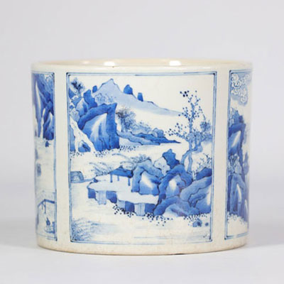 Blue and white brush pot decorated with several mountain scenes and figures from 19th century