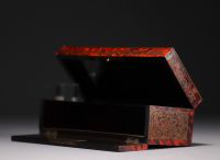 Set of four marquetry and lacquer boxes including a glove box stamped Tahan F. du Roi in Paris.