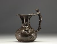 Set of a polished pewter Art Nouveau jug and vase, circa 1900.