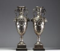 Imposing pair of Louis XVI chased and repoussé silver vases, hallmarks of Paris, 18th century.