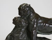 L. BOUCHÉ (19th-20th century) Couple of panthers - Glazed terracotta, signed.