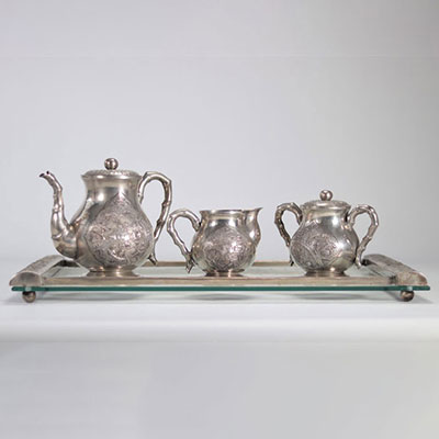 Chinese sterling silver service decorated with landscapes and handles decorated with bamboo probably from Thai origin