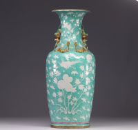 China - large porcelain vase decorated with flowers and birds, turquoise glaze, 19th century.