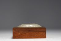 China - Wooden box surmounted by a white jade medallion carved with a mage design (18th century jade)