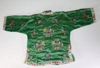 China - Manchu woman costume in embroidered silk, early 20th century.