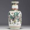 China - A green family polychrome porcelain vase (mounted as a lamp) decorated with dignitaries, 19th century.