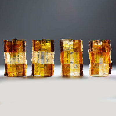 Jean Simon LABRET (20th century) Suite of four Brutalist sconces in orange glass.