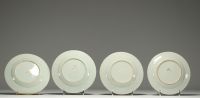 China - Set of four Famille Rose porcelain plates decorated with flowers.