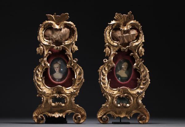 A pair of carved and gilt wood frames, one containing a miniature painting of a lady's portrait, 19th century.