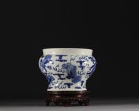 China - A blue-white porcelain vase decorated with lions, Kangxi mark.