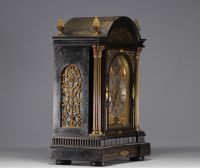 Mantel clock with striking mechanism in veneered wood, bronze and brass, 18th century.