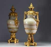 Imposing pair of Louis XVI chased gilt bronze and onyx cassolettes.