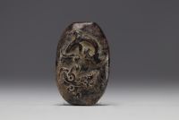 China - Carved jade pendant with Chilon decoration.