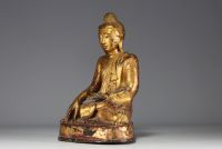 Asie - Bouddha en bronze doré en position de la prise de la terre à témoin, époque XIXème.