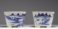 China - Pair of blue-white porcelain planters with landscape decoration, Qing period.