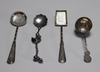 Asia - Set of four silver spoons decorated with bamboo and flowers.