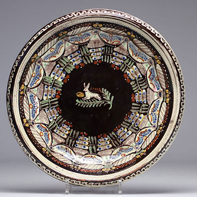 Glazed stoneware plate decorated with a rabbit