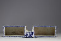 White-blue porcelain planter with floral and bird decoration in cartridge.