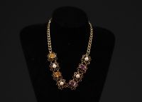 Necklace in 18k yellow gold, amethyst, octagon-cut yellow sapphire and natural pearls.