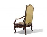 Carved wooden armchair and a seat with floral motifs from the 18th century