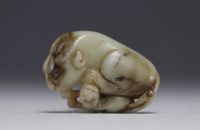 China - Carved jade reclining lions, 18th century.