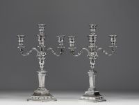 Pair of solid silver candlesticks, five points of light, hallmarks (three diamonds) on the base.