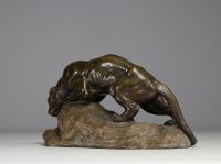 Armand FAGOTTO (19th-20th century) ‘Lionne s'abreuvant’ Sculpture in patinated terracotta, 19th-20th century, signed.